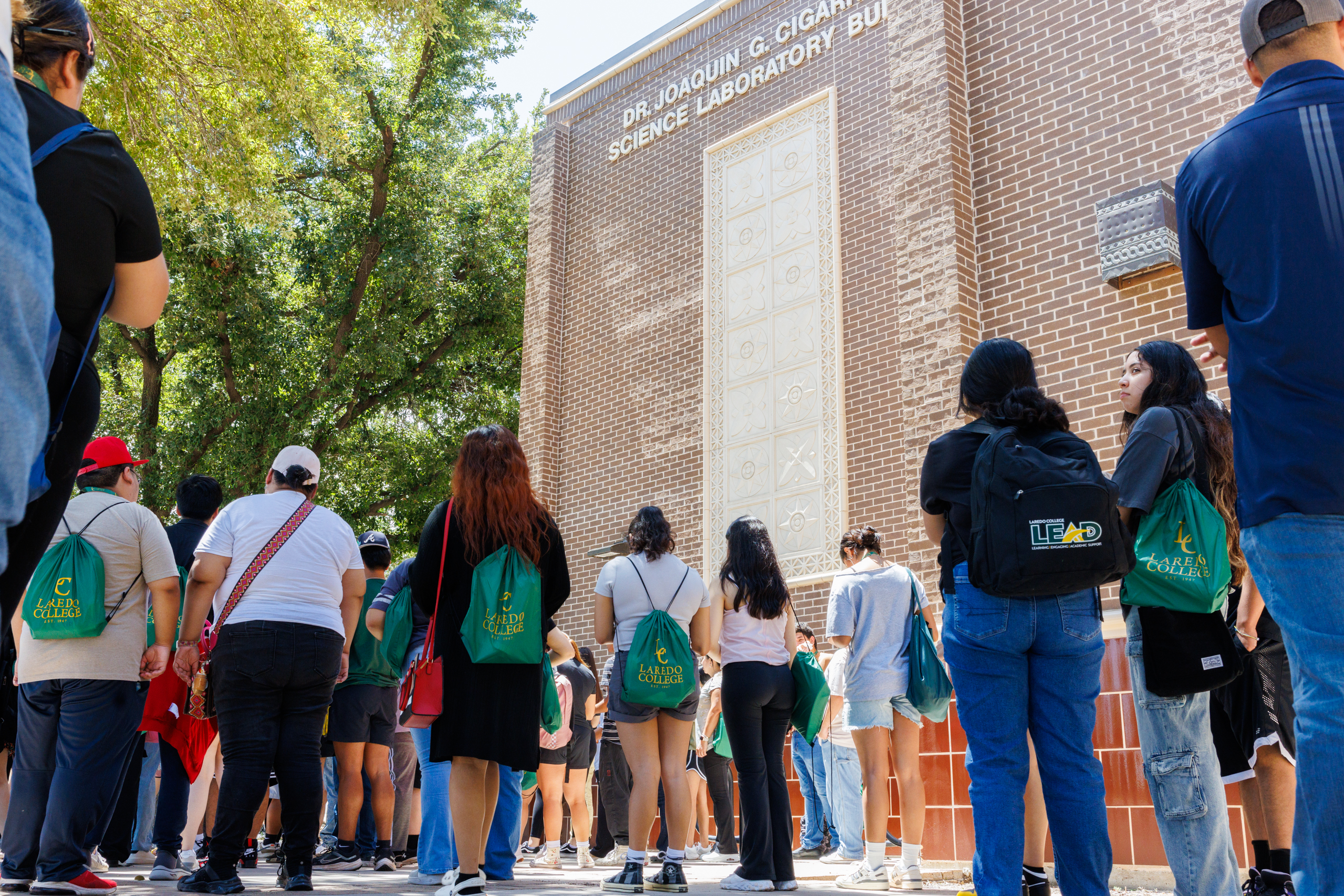 students walk toward building