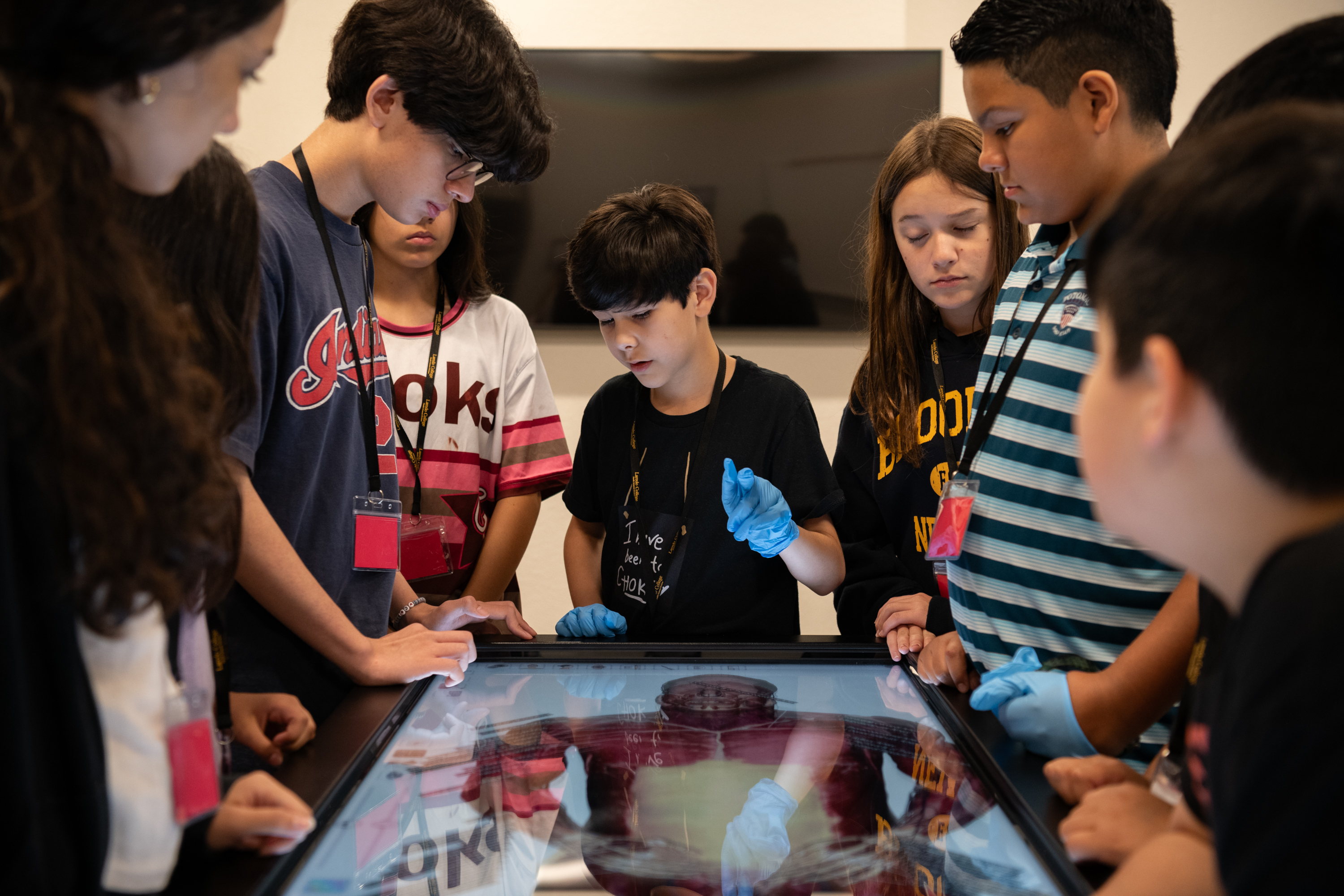 Camp participant interacts with machinery