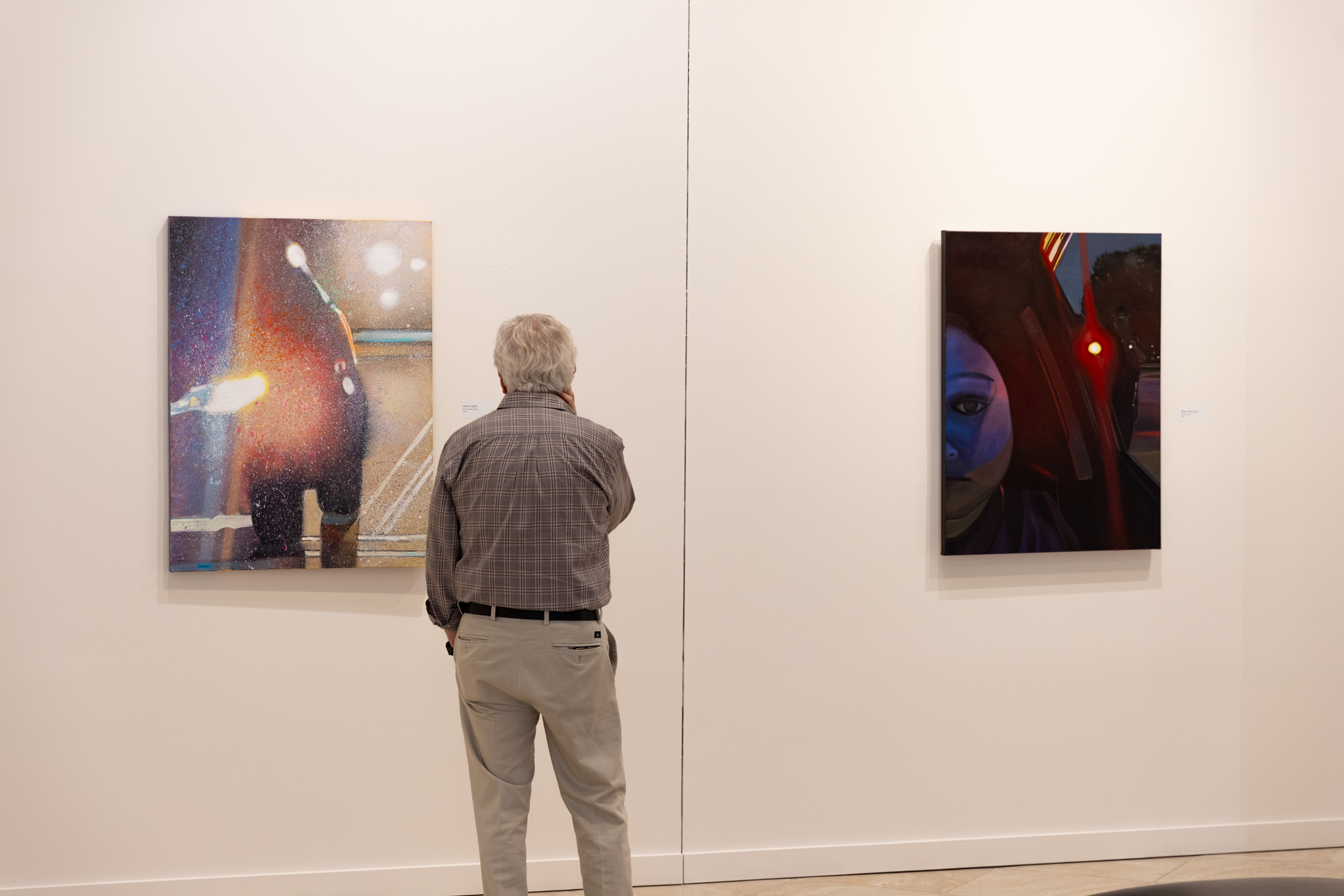 gallery visitor eyes paintings